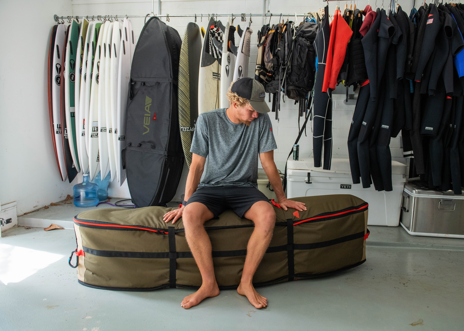 John John Florence in his board garage with the VEIA Tour Bag