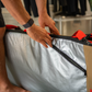 John John Florence using the external wax/fin/accessory pocket on the VEIA JJF Day Bag.